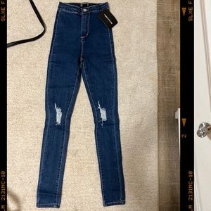 Mid Blue Rip Knee Disco Skinny Jeans